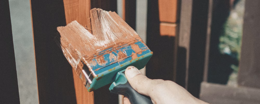 Painting fence representing Ronseal